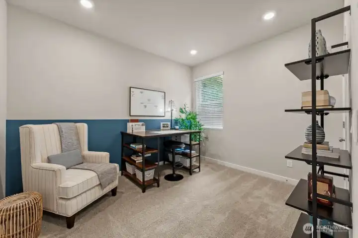 Bedroom 5 OR den on the main floor conveniently located near 3/4 bathroom. Photo rendering is representational and may be virtually staged. Actual home is under construction and finishes, elevation, and paint colors may vary. See site agent for details. Bedroom 5 OR den on the main floor conveniently located near 3/4 bathroom. Photo rendering is representational and may be virtually staged. Actual home is under construction and finishes, elevation, and paint colors may vary. See site agent for details.