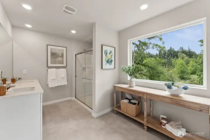 Primary suite bathroom. Photo rendering is representational and may be virtually staged. Actual home is under construction and finishes, elevation, and paint colors may vary. See site agent for details. Primary suite bathroom. Photo rendering is representational and may be virtually staged. Actual home is under construction and finishes, elevation, and paint colors may vary. See site agent for details.