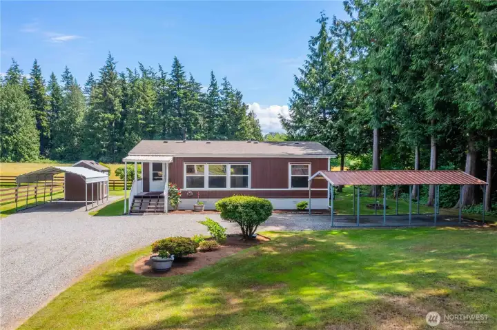 Includes two carports. Includes two carports.