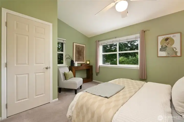 The NE-facing primary bedroom with a celling fan and 4' closet has ample space for a bureau or desk. The NE-facing primary bedroom with a celling fan and 4' closet has ample space for a bureau or desk.