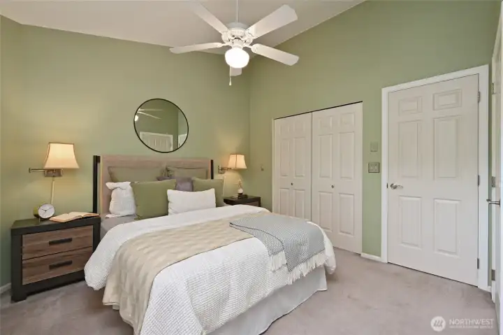 Shown is the larger of the two primary bedroom closets (7 1/2') with six-panel doors. Plenty of space for king-sized bed and two side tables. Shown is the larger of the two primary bedroom closets (7 1/2') with six-panel doors. Plenty of space for king-sized bed and two side tables.