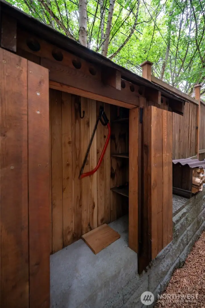 The outdoor storage locker has room for gardening supplies. The outdoor storage locker has room for gardening supplies.
