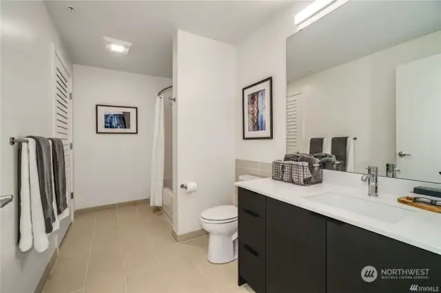 Full bathroom. Clean and sleek design.