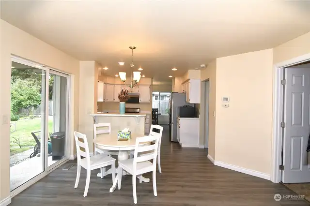 breakfast area, entry to dining room, right to garage.