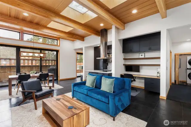 A feast for the senses! Fir ceilings and skylights, wonderful built-in office area, and concrete radiant-heated floors throughout for low-maintenance comfort.