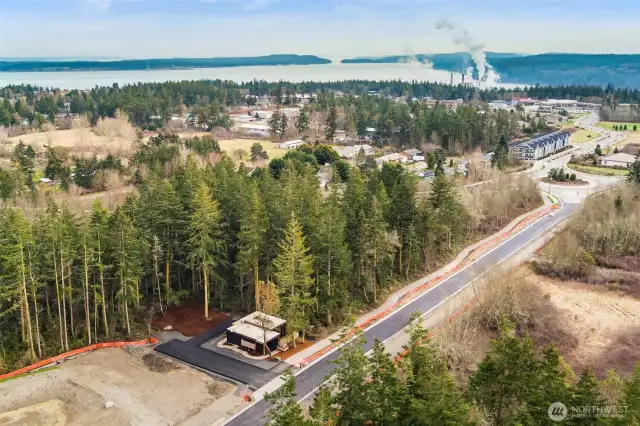 The main entry road, Rainier, has been newly paved and will include sidewalks and bike paths. This is a beautiful oasis but still close to town and all Port Townsend offers. Port Townsend Bay is in the distance, just a short drive or hike away.