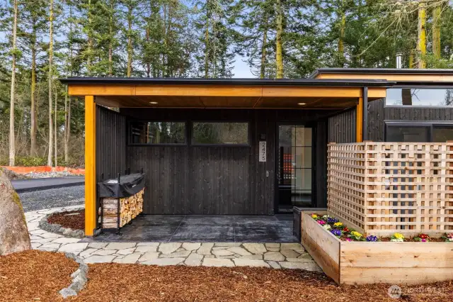 Less than one year old, this home has been thoughtfully designed to reflect all the PNW has to offer. Cedar tongue-in-groove siding has been used on the exterior, and stained concrete surfaces for the covered entry and patios.