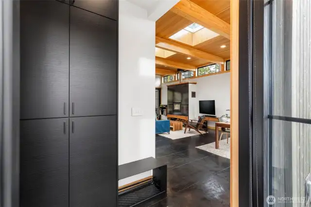 This dramatic entry sets the tone for a special experience! Built-in entry closets for your convenience keeps everything organized.