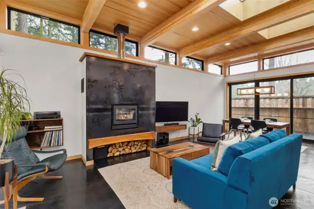 Who wouldn't love this beautiful fireplace on chilly, stormy nights? Custom steel surrounds a wood-burning insert for simple beauty.