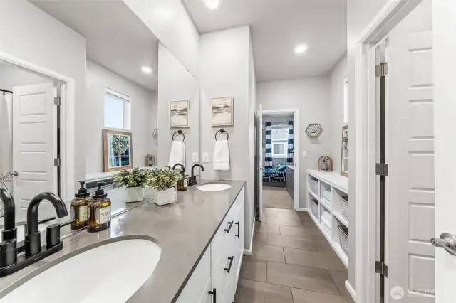 Main Bath with door to hallway & another to Bed 3