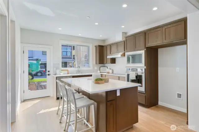 Kitchen with large island & bar seating