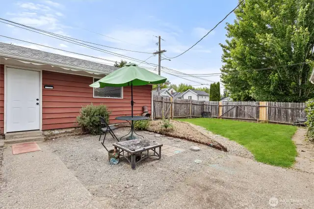 Back Yard Patio Area.  Secure, convenient access to the 1-Car Garage.
