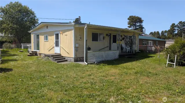 2 bedroom westside home with mature landscape and spacious yard.
