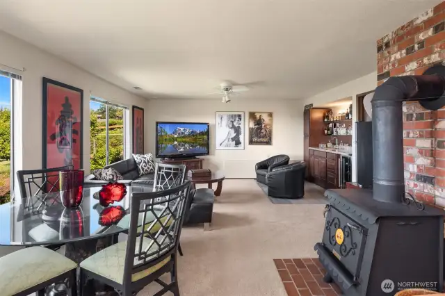 Expansive and opens to the second level deck where you have your hot tub.