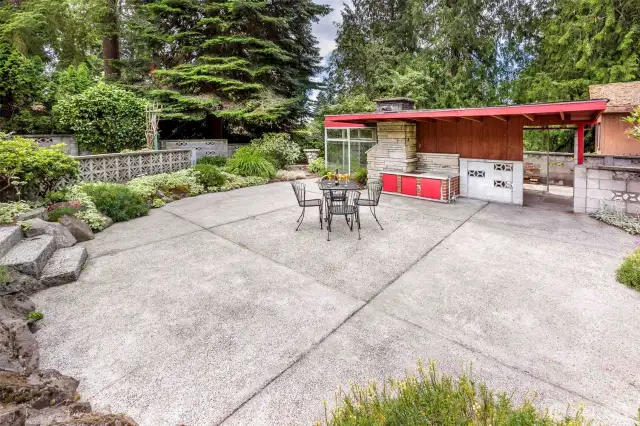 Expansive, fully fenced backyard with entertainment-sized patio, charming greenhouse, and a dedicated garden shed. A private outdoor oasis perfect for summer barbecues, quiet mornings, or gardening enthusiasts.