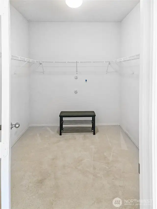 Extra large walk-in closet in the primary bedroom.