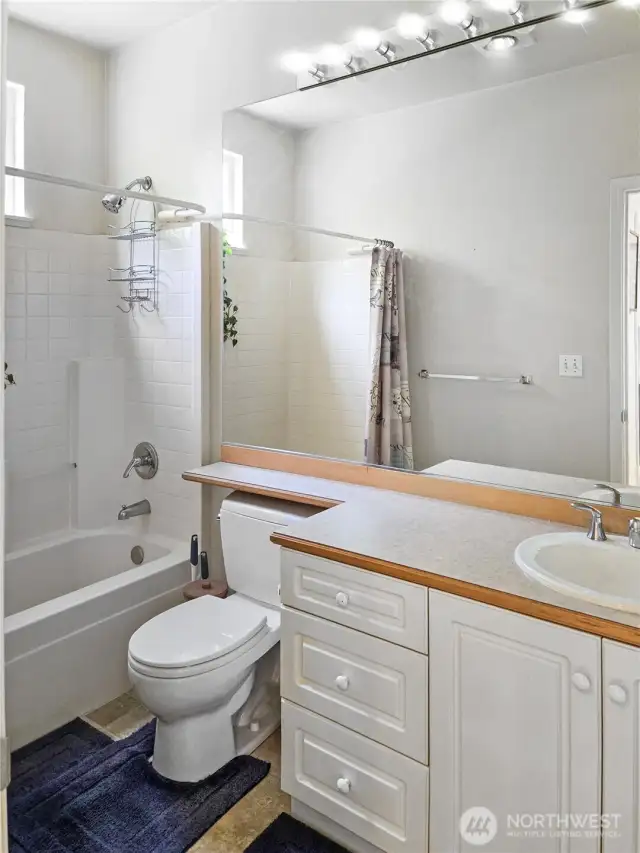 Second floor full bathroom across from the bedroom.