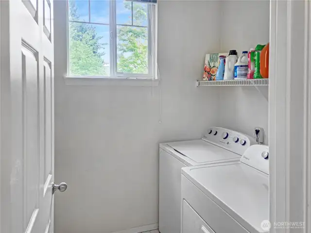 Large second floor laundry area with a window!