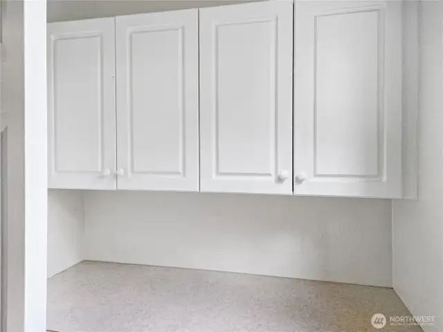 Additional storage in the laundry area.