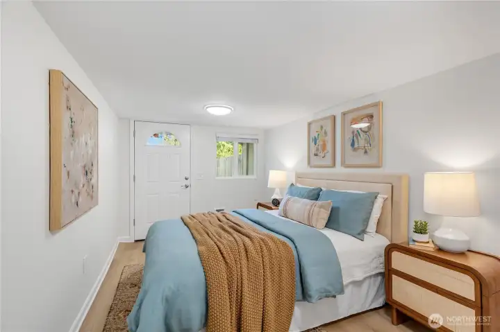 Lower bedroom is adjacent exterior relaxation space.