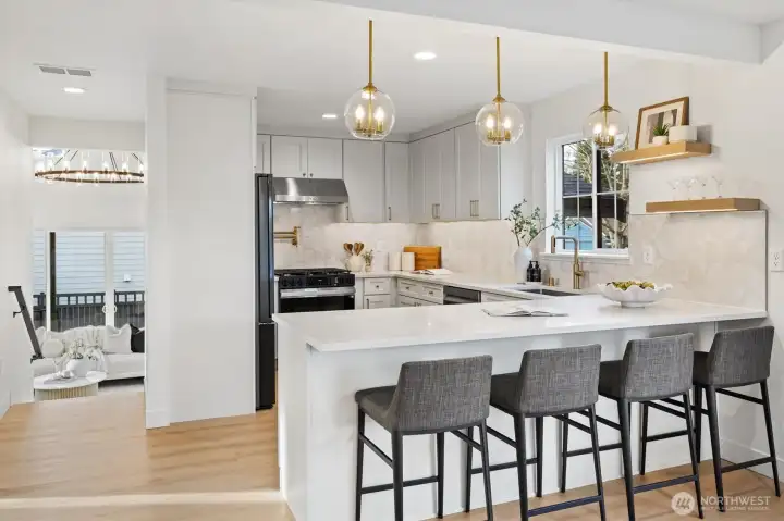 You dream kitchen with gold hardware and designer backsplash tile, taj mahal quartz & premium Samsung appliances awaits...