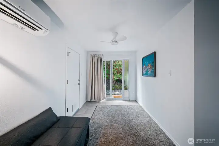This wing of the primary bedroom features a slider to the private rear yard. Dog ready with doggie door that leads to a fully fenced dog run