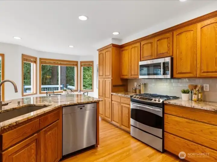 QUALITY CABINETS AND WOOD DETAIL THROUGHOUT