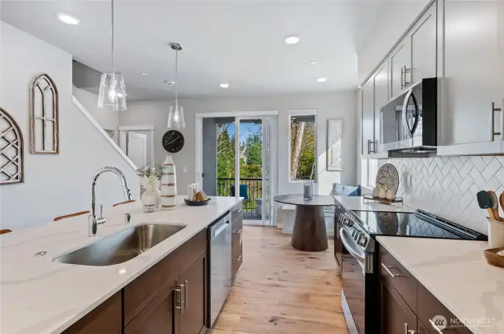 Photos are of community model home. Color packages and upgrades will vary from home to home.