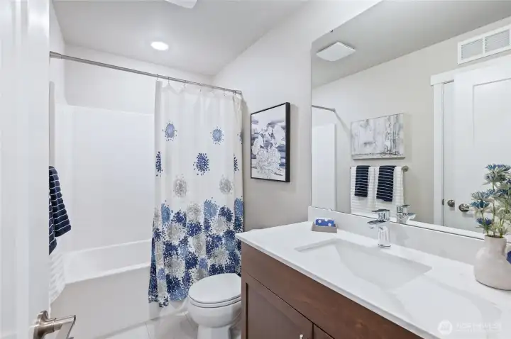 Photos are of community model home. Color packages and upgrades will vary from home to home.