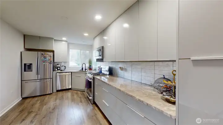 Main kitchen with new cabinets and Quartz counters.