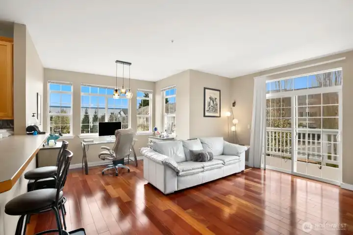 Lovely light-filled living area with dining room area or the perfect place for your home office.