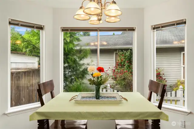 Another sweet bay window allowing so much light in the dining room.