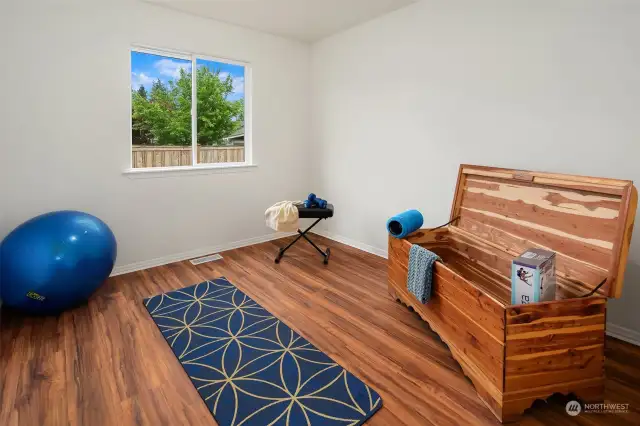 2nd bedroom with new floors, lighting & paint!