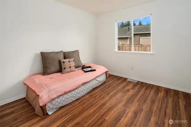 3rd bedroom with new floors, lighting & paint!