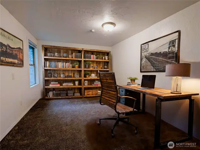 A view into the bonus room/ home office / den.               Virtually staged to show versatility