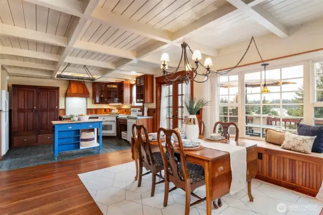 Dining with original fir floors, French doors to deck