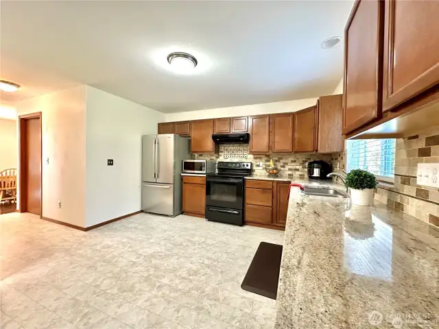Large kitchen with plenty of counter space.