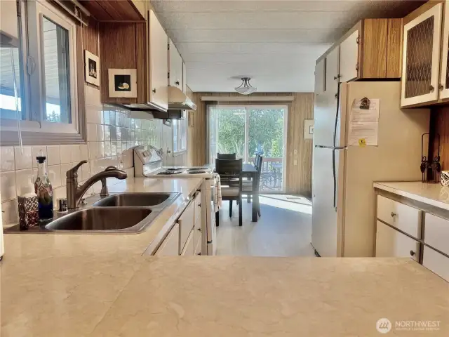 Great cabinets and counter space. The dining room is right beside the kitchen.