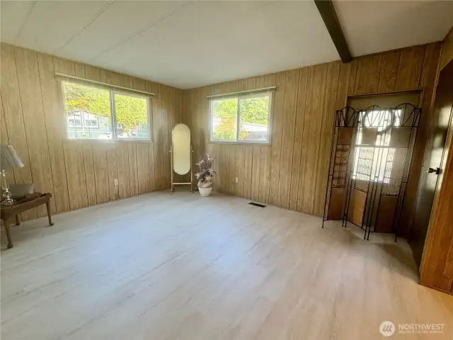 The primary bedroom suite includes a large walk-in closet.