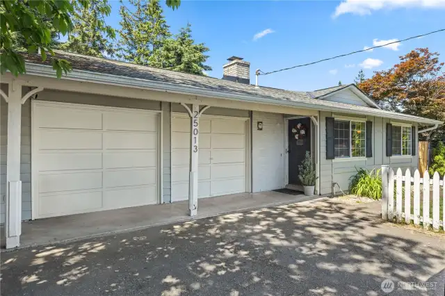 1 car garage, bay on the left is the 4th bedroom & 1/2 bath