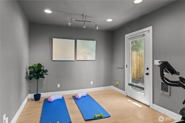 Fourth bedroom off the single car garage with half bath with separate entry