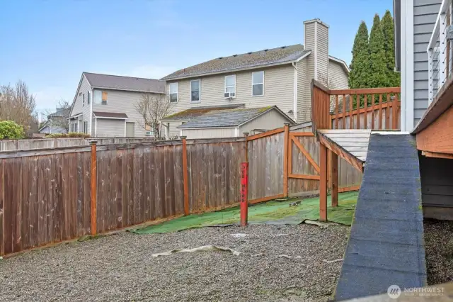 Fully fenced dog run, with ramp and pet door.