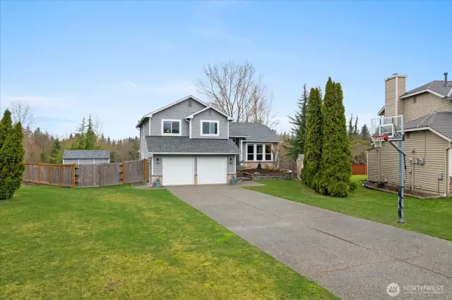 Unlike many Marysville homes with short, sloped driveways, this property offers a level, long driveway with parking for 8-10 vehicles off-street (or your trailer/RV).