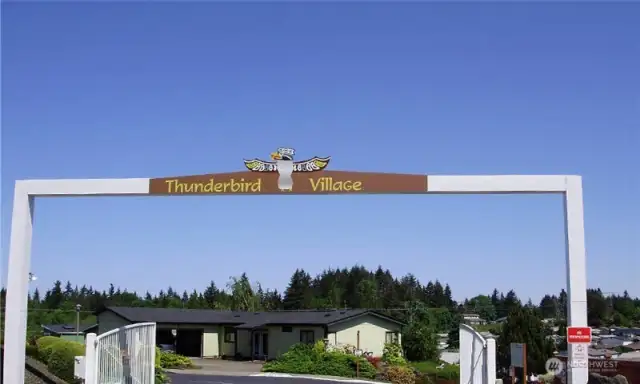 Main gate for Thunderbird Village. Locked at night to make you feel safe and secure.