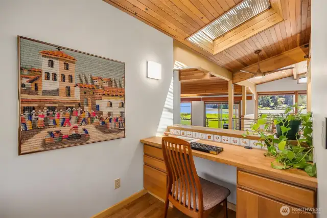 Cozy office on second floor, beyond kitchen.