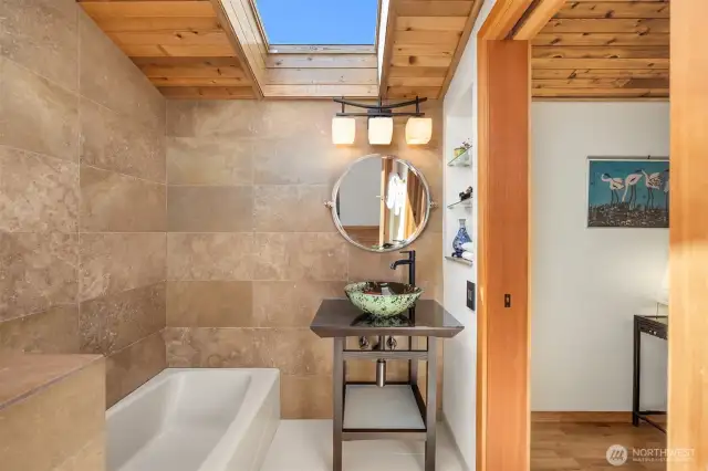 Spa like bath with skylight.
