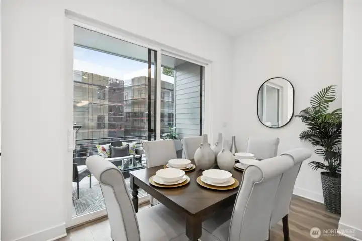 Dining with access to covered patio (Facade, Ext Colors, Interior Photos & Floor Plans for illustrative purposes only. Actual Facade, Ext Colors, Interiors & Floor Plans may differ.)