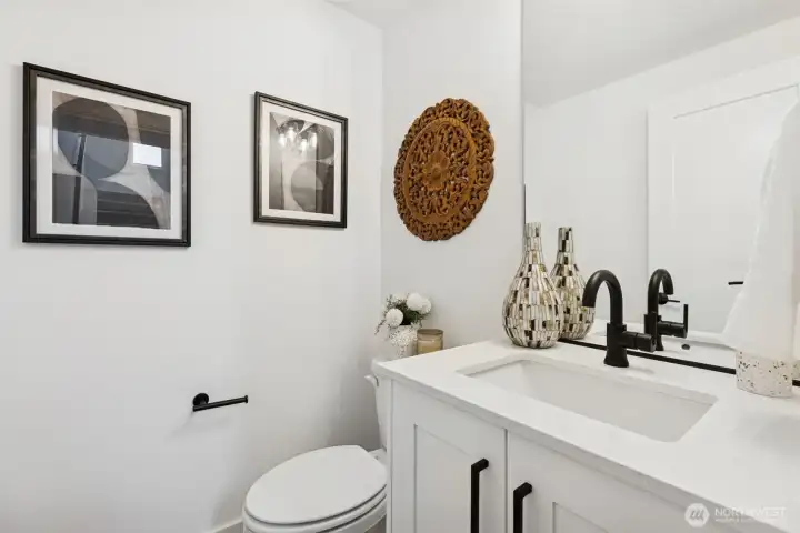 Powder bath on main floor (actual bathroom) (Facade, Ext Colors, Interior Photos & Floor Plans for illustrative purposes only. Actual Facade, Ext Colors, Interiors & Floor Plans may differ.)