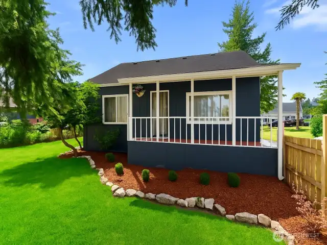 The grass and roof color has been enhanced digitally