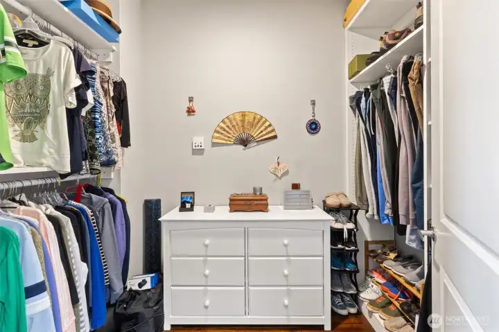 Walk-in closet with the Primary Suite.